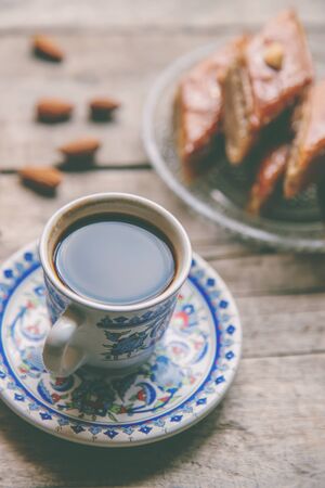 A cup of Turkish coffee and baklava. Selective focus. Drink.の写真素材