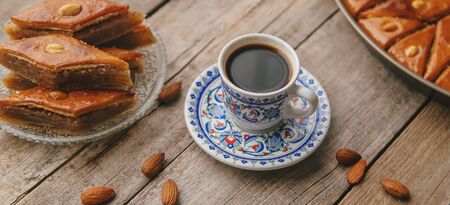 A cup of Turkish coffee and baklava. Selective focus. Drink.の写真素材