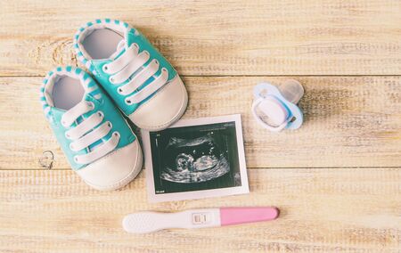Ultrasound picture of a baby's photograph and accessories. Selective focus. child.の写真素材