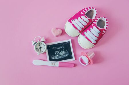 Ultrasound picture of a baby's photograph and accessories. Selective focus. child.