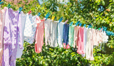 Baby clothes are drying on the street. Selective focus. nature.の写真素材