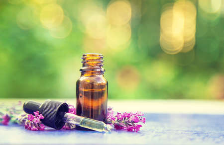 Lavender essential oil in a small bottle. Selective focus.nature.の写真素材