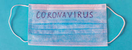 Coronavirus. Remedies. Masks on a blue background. Selective focus medicineの写真素材