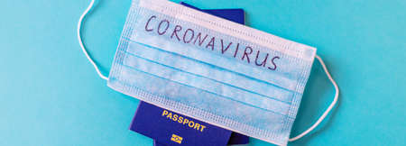 Coronavirus the concept of a ban on flights between countries. International passport. Selective focus. medicineの写真素材