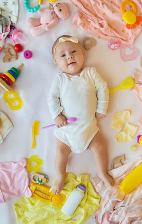 Baby with clothes and accessories. Selective focus. People.の写真素材