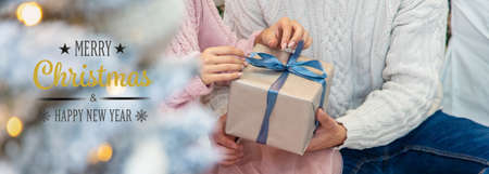 people with Christmas gifts in their hands. selective focus. happy.の写真素材