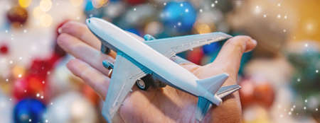 christmas background with airplane. travels. selective focus nature