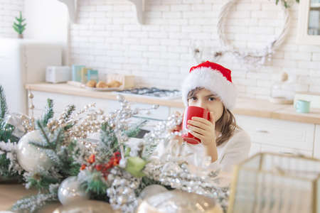 The child bakes and tastes Christmas cookies. Selective focus. holiday.の写真素材