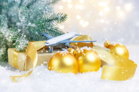 Beautiful Christmas background with airplane. Selective focus. Celebration.の写真素材