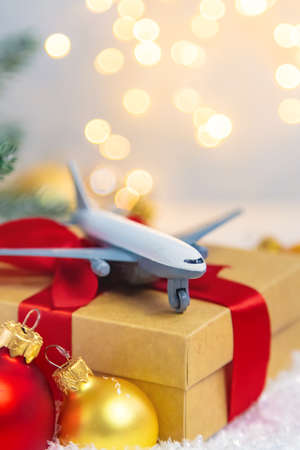 Beautiful Christmas background with airplane. Selective focus. Celebration.の写真素材