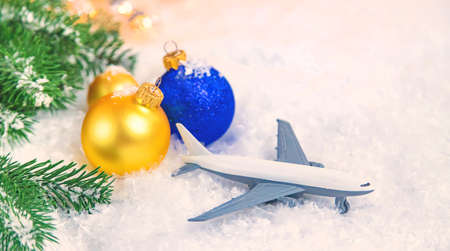 Beautiful Christmas background with airplane. Selective focus. Celebration.の写真素材
