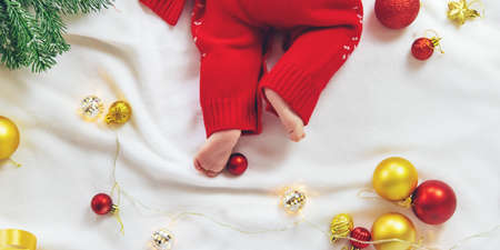 Christmas photo of baby with New Year's decor. selective focus. holiday.の写真素材
