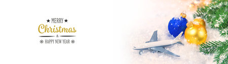 Beautiful Christmas background with airplane. Selective focus. Celebration.の写真素材