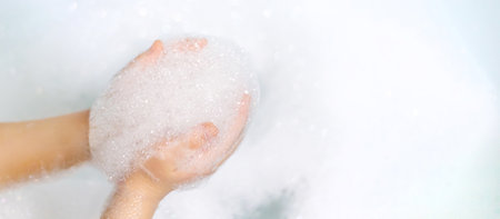 Wash hands thoroughly with soapy water. Selective focus. Hands.の写真素材