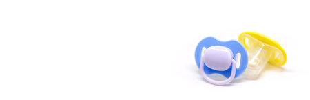 Dummy pacifiers for newborns in different colors. Selective focus. baby.