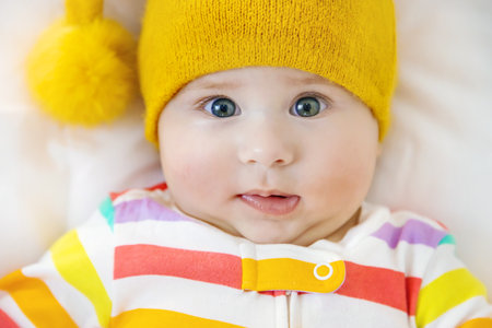 The baby in the crib goes to bed. Selective focus. People.の写真素材