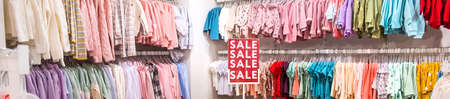 Sale in a store with clothes. Selective focus. Shop.の写真素材