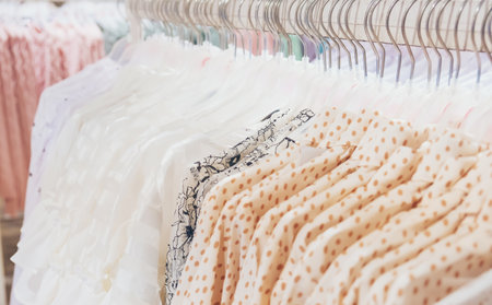 Clothes hangers in the store. Selective focus. money.