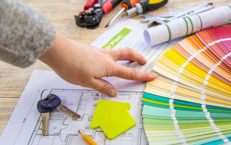 Paint palette house plan and repair tools. Selective focus. Color.の写真素材