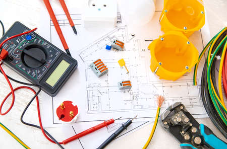Electrical repair tools in the house. Selective focus. plan