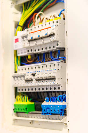 Electric panel in the house. Selective focus. White.