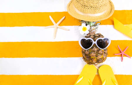 Beach towel with relaxation accessories. Selective focus. Sea.の写真素材