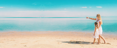 Child on the beach. Sea shore. Selective focus. nature.