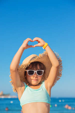 A child at the sea is a girl. Selective focus. Kid.の写真素材
