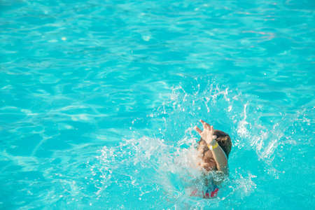 The child jumps into the pool. Selective focus. nature.