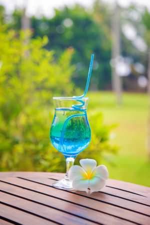 Blue lagoon cocktail by the ocean. Selective focus. Nature.の写真素材