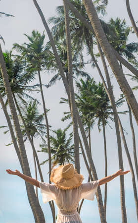 Girl in Sri Lanka on an island with a lighthouse. Selective focus. nature.の写真素材