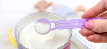 baby bottle with milk on white background. Selective focus. Kid.の写真素材