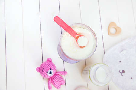 baby bottle with milk on white background. Selective focus. Kid.