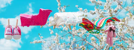 Baby clothes are drying on the street. Selective focus. nature.の写真素材