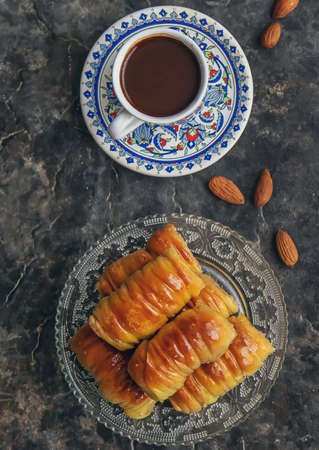 A cup of Turkish coffee and baklava. Selective focus. drink.の写真素材
