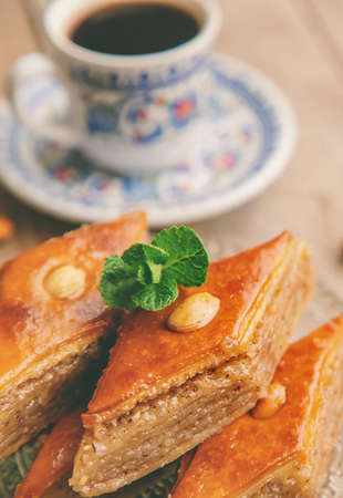 A cup of Turkish coffee and baklava. Selective focus. Drink.の写真素材
