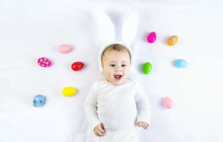 Happy easter baby holiday concept on white background. Selective focus. Child.