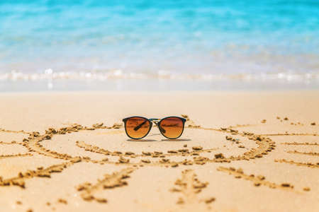 Sun painted on the sand. Selective focus. Nature.の写真素材