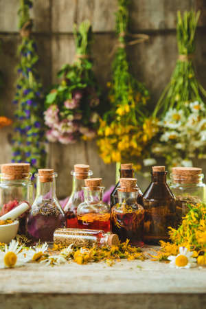 Tincture of medicinal herbs in bottles. Selective focus. Nature.の写真素材