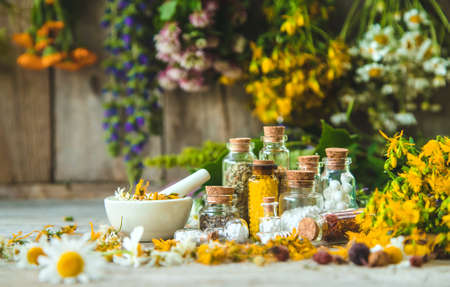 Tincture of medicinal herbs in bottles. Selective focus. Nature.の写真素材
