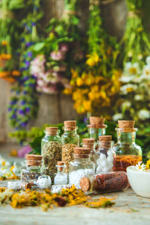 Tincture of medicinal herbs in bottles. Selective focus. Nature.の写真素材