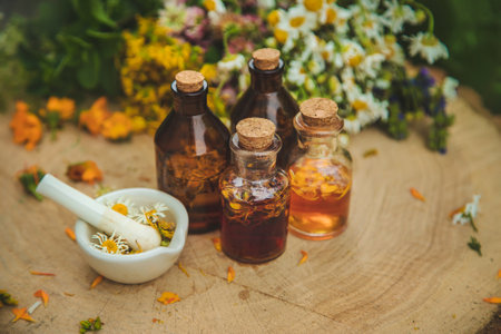 Tincture of medicinal herbs in bottles. Selective focus. Nature.の写真素材