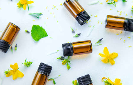 Essential oils and herbal extracts in small bottles. Selective focus. nature.