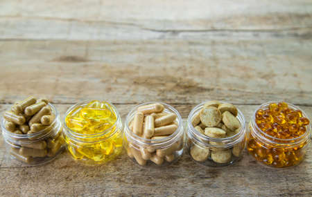Supplements and vitamins with medicinal herbs. Selective focus. Nature.の写真素材