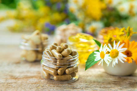 Supplements and vitamins with medicinal herbs. Selective focus. Nature.の写真素材