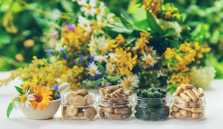 Supplements and vitamins with medicinal herbs. Selective focus. Nature.の写真素材