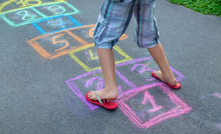 Children play classics on the street. Selective focus. Kids.の写真素材