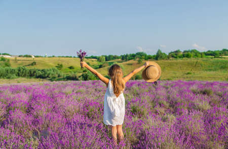 A child in a lavender field. Selective focus. Nature.の写真素材