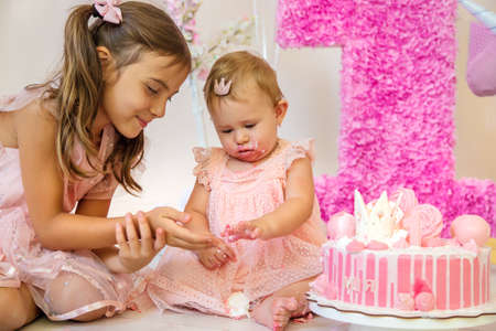 The first year of the baby is a cake. Selective focus. Child.