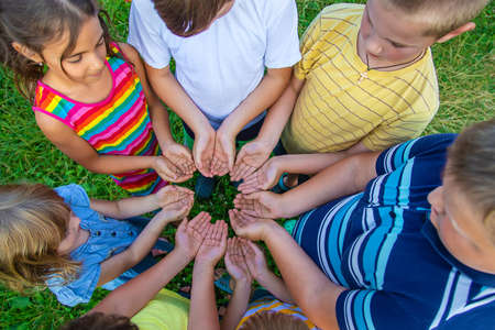 Children's friendship, children's hands on the street. Selective focus. Kid.の写真素材